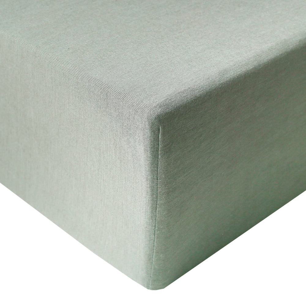 Copper Pearl Briar knit crib sheet close-up showing soft, breathable fabric for comfort