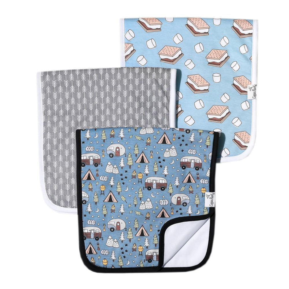 Copper Pearl Bridger Set burp cloth on shoulder with soft, absorbent fabric.