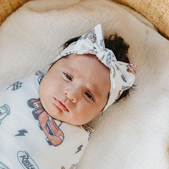 Copper Pearl Cars print baby headband made with soft fabric for breathable wear all day.
