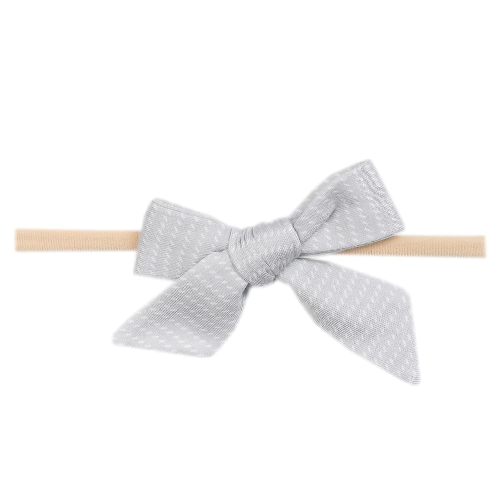 Copper Pearl Taylor bow closeup showing soft fabric and delicate bow detail