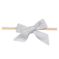 Copper Pearl Taylor bow closeup showing soft fabric and delicate bow detail