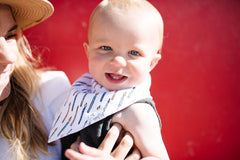 Copper Pearl Confetti bib adjustable snaps ensure a comfy fit from newborn to toddler.