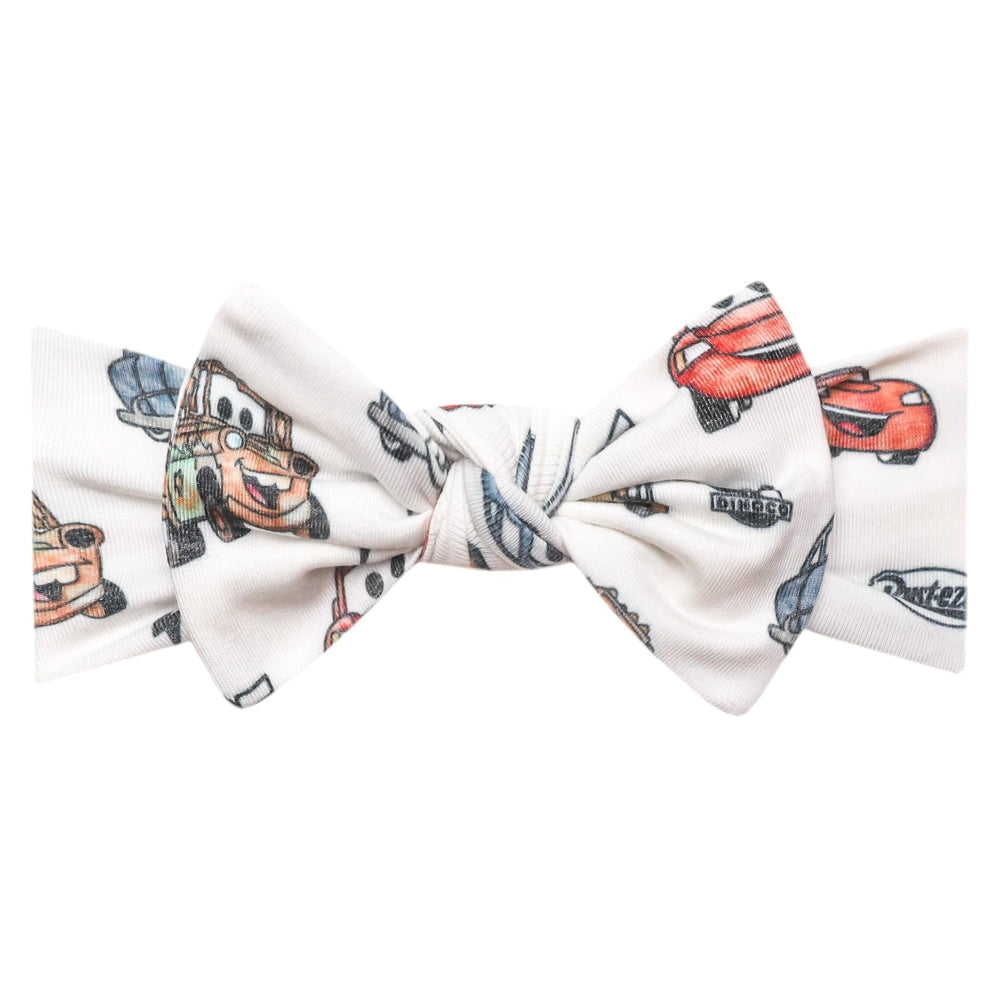 Copper Pearl Disney Cars knit headband featuring Cars print for newborn comfort and style.