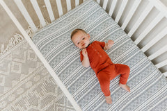 Copper Pearl gift-ready packaging makes this crib sheet an ideal baby shower gift