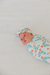 Copper Pearl Holly nursing cover setup with blanket draped