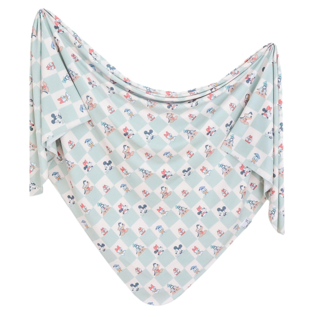 Copper Pearl swaddle blanket Mickey Mouse and Friends close-up, soft fabric for cozy swaddling.