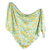 Copper Pearl Lemon swaddle blanket shows soft-knit texture for newborn comfort