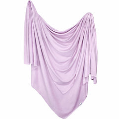 Copper Pearl Lily swaddle blanket offers soft, breathable knit for newborn swaddling.