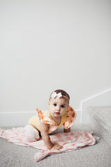 Copper Pearl London receiving blanket in use as versatile cover and comfort for naps
