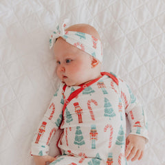 Copper Pearl Nicholas gown, side view highlighting stretch knit and diaper-change ease.