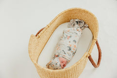Copper Pearl Nightmare Before Christmas swaddle blanket in use as playmat demonstrates versatility.