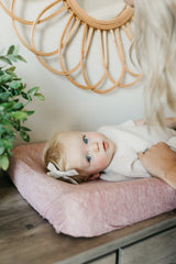Copper Pearl changing pad cover with gift-ready packaging makes a thoughtful baby shower gift.
