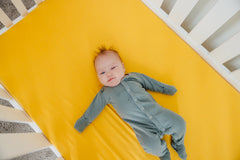 Copper Pearl banana knit crib sheet in a nursery coordinates with CP themes