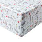 Copper Pearl Trout knit crib sheet on a standard mattress for cozy nights