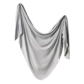 Copper Pearl Stone swaddle blanket texture highlights soft, breathable knit for all-season comfort.