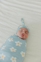Copper Pearl stylish prints swaddle blanket coordinating with outfits.