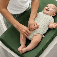 Coreeky leaf-pattern changing pad cover blends with any nursery decor.