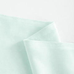 Cotton Stich envelope-closure pillowcase in apple green for quick, secure pillow insertion.