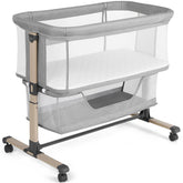 Cowiewie bassinet bedside sleeper with breathable mesh fabric for airflow.