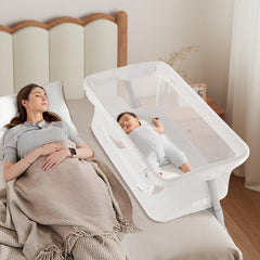Cowiewie bassinet over-bed attachment helps keep baby within arm's reach