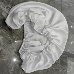 Cozysilk elastic-edge bassinet sheet stays securely fit on mattresses