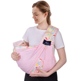 Cuby pink flamingo baby carrier front view shows comfortable support.