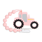 Cuebo Baby Tractor Teether pink front view with easy grip for soothing gums