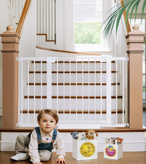 Cumbor baby gate installed on stairs showing secure closure and wide passage.