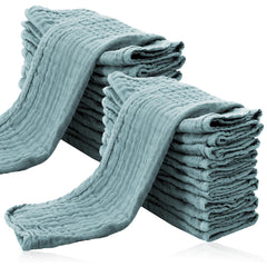 Cute Castle 24-pack muslin burp cloths in package, soft and absorbent for feeding.