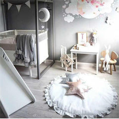 CVGAGIF round play mat folded for easy transport and storage in a nursery