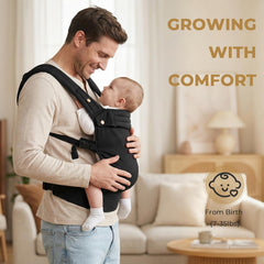 CycleMore baby carrier in cuddle mode supporting a newborn with hip-friendly posture