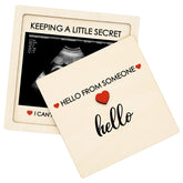 CYUXING ultrasound photo frame inside a wooden surprise box, ideal for grandparents' pregnancy announcements.