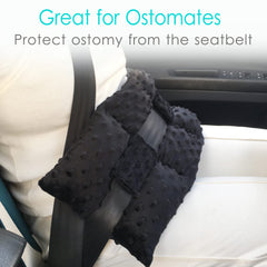 D. Cozy ostomy seat belt pillow placed on car seat protecting the stoma during travel.