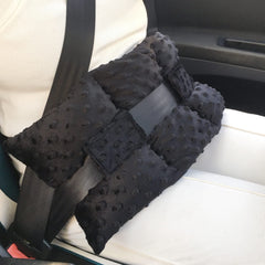 D. Cozy ostomy seat belt pillow front view cushions stoma area for driving comfort.
