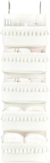 Dahey over-the-door organizer with five pockets in a boho nursery setup, white finish.