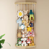 Dayacoco wooden corner shelf for stuffed animals, freeing floor space in a nursery.