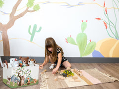 DDBASKET mountain book box neatly stores children's books for cozy reading corners.
