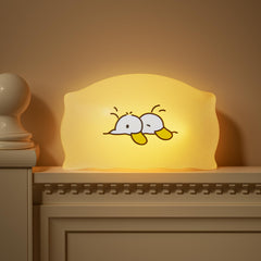 Dealswin squishy duck night light with warm glow for nighttime feeds and diaper changes.