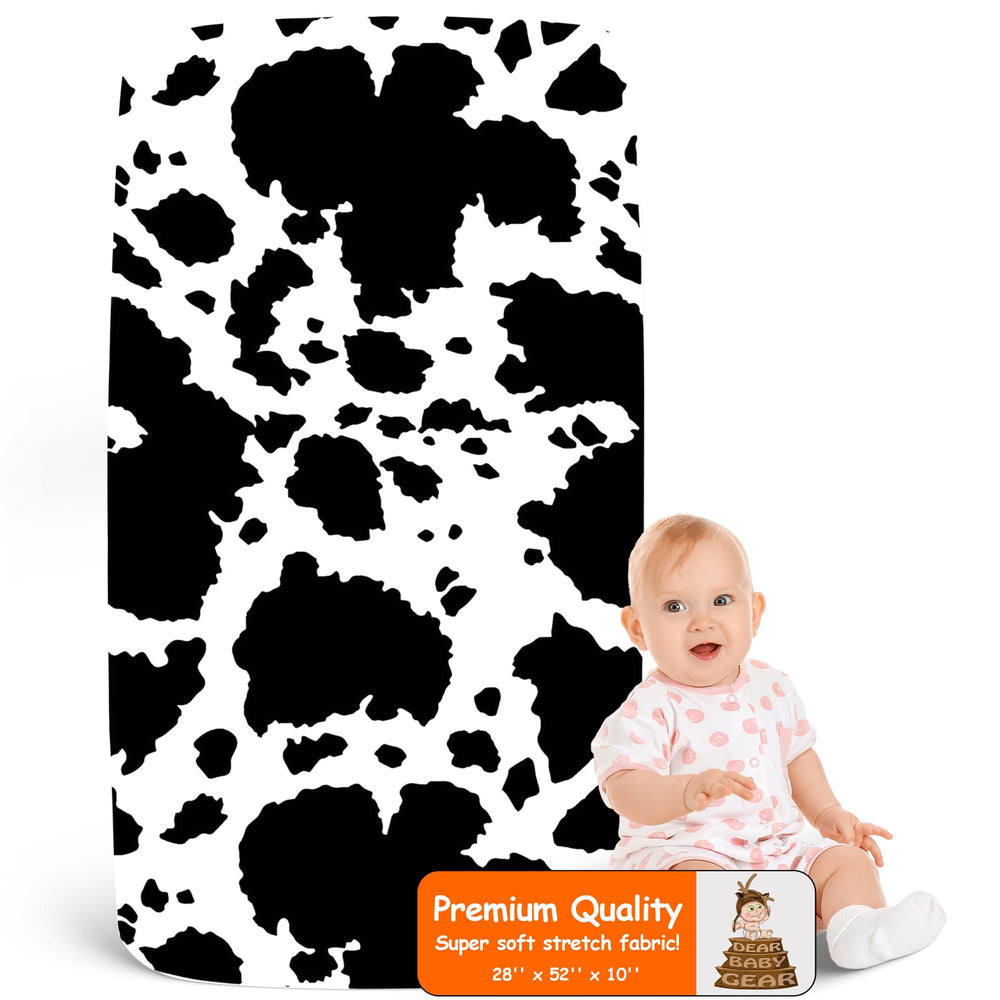 Dear Baby Gear Holstein Cow crib sheet closeup shows soft cotton-poly blend for comfort.