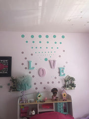 DecalVenue matte finish polka dots reduce glare on walls.