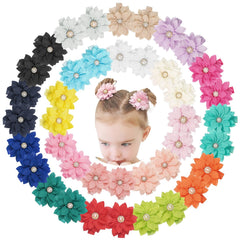DED chiffon flower clip with rhinestone embellishment for secure hold in fine hair.