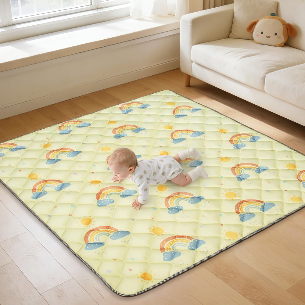 Deeteck Rainbow Play Mat laid flat for safe tummy time.