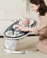 Derson electric infant swing side view showing calm motion for newborns