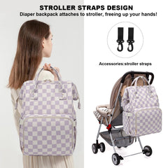 Dezcrab diaper backpack attached to a stroller for hands-free travel.