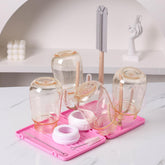 DIJIAMEIYA pink bottle drying rack for travel and home use.
