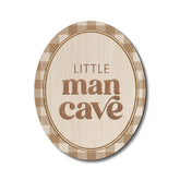 Dilemat Little Man Cave oval wall art enhances nursery ambiance with vintage charm