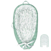 DILIMI baby lounger cover in green leaf design, gentle on skin for newborns.