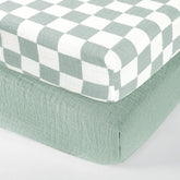 DILIMI muslin crib sheet in green checkered pattern, soft and breathable for baby skin.