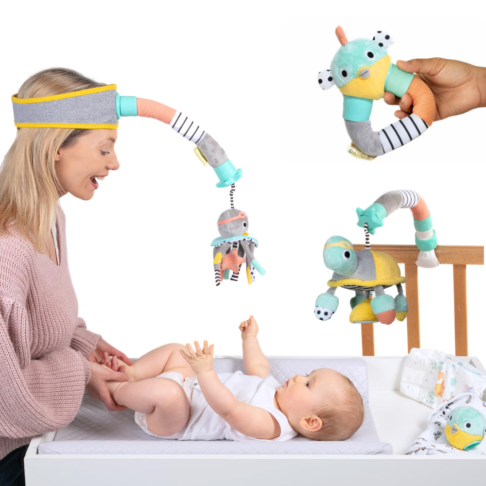 DINGLE DANGLE deluxe headband diaper changer calms wriggly babies.