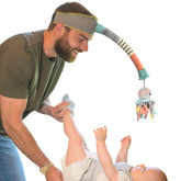 Dingle Dangle diaper changing distractor headband calms baby during changes